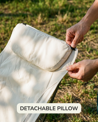 Detachable pillow being attached to a chair outdoors